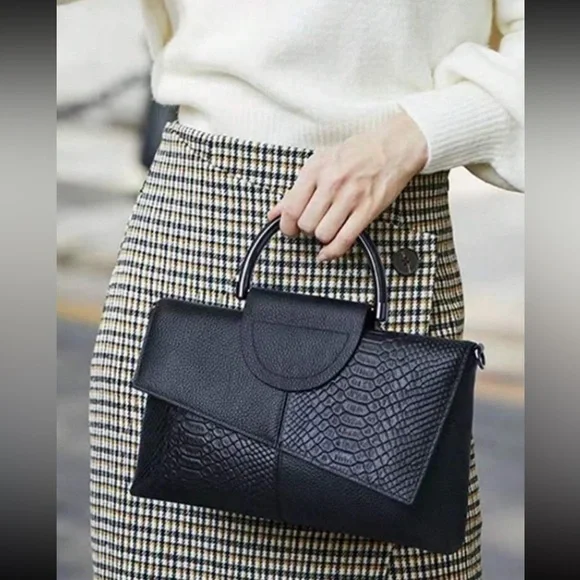 Black snakeskin print vegan leather clutchcrossbody bag